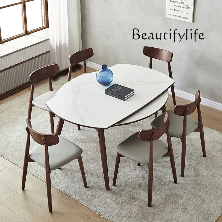 Nordic solid wood dining table household retractable folding rock slab dining table and chair combination light luxury
Nordic solid wood dining table household retractable folding rock slab dining table and chair combination light luxury
