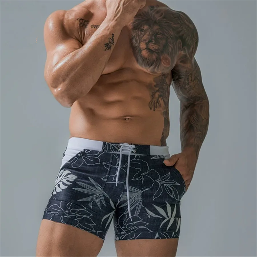 Новые летние мужские пляжные плавки с принтом на шнурке и эластичной резинкой на талии, повседневные шорты, мужские быстросохнущие купальники, шорты больших размеров
Новые летние мужские пляжные плавки с принтом на шнурке и эластичной резинкой на талии, повседневные шорты, мужские быстросохнущие купальники, шорты больших размеров