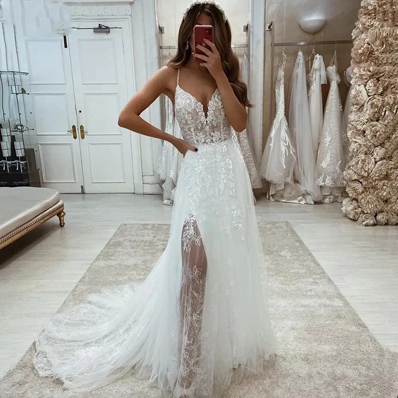 Sexy Glitter Lace Side Slit Wedding Dresses Spaghetti Straps Sleeveless V-Neck Appliques Boho Bridal Gowns robe de mariée
Sexy Glitter Lace Side Slit Wedding Dresses Spaghetti Straps Sleeveless V-Neck Appliques Boho Bridal Gowns robe de mariée