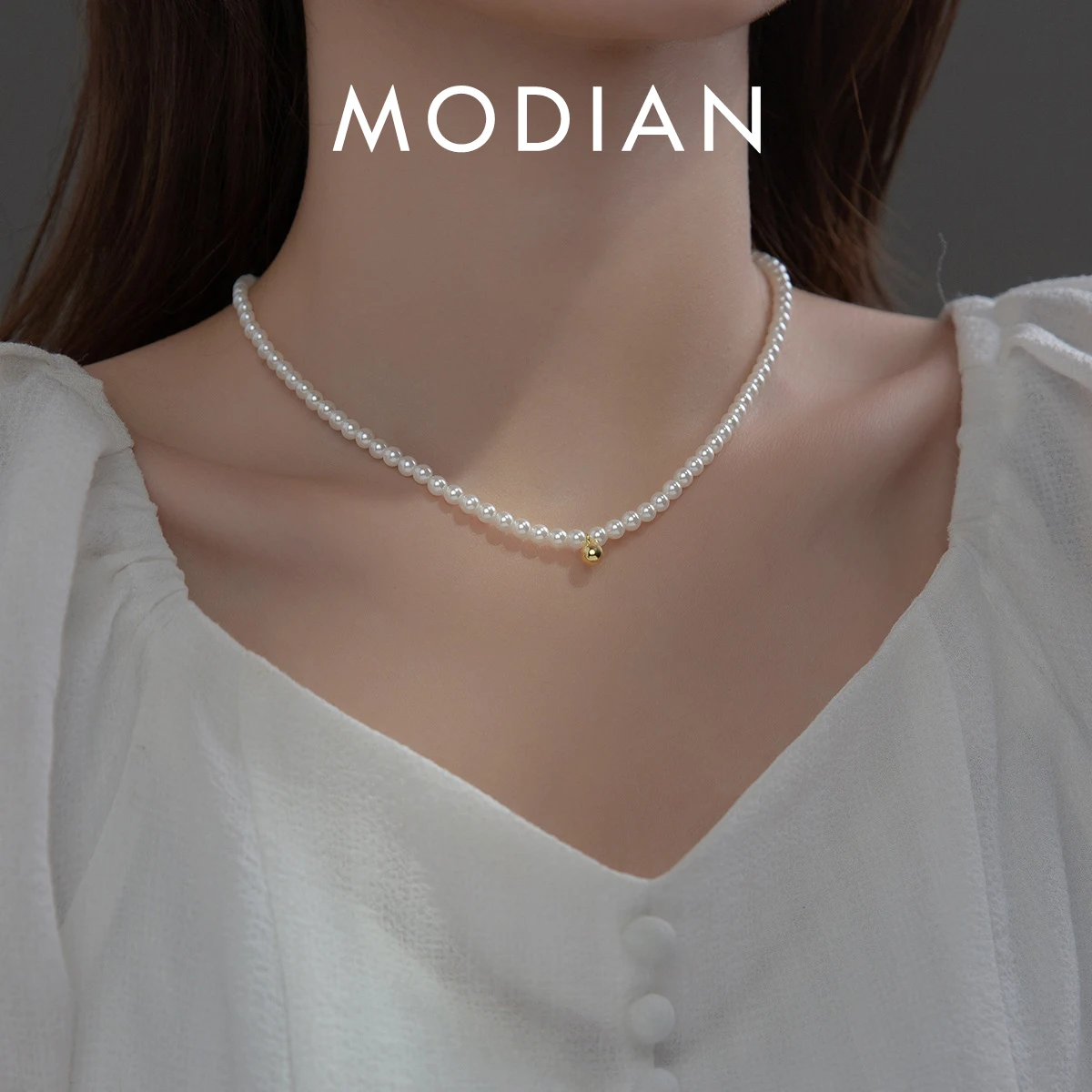 MODIAN 925 Sterling Silver Elegant White Pearl Charm Necklace Shell Pearl Gold Beads Choker Necklace For Women Fine Jewelry
MODIAN 925 Sterling Silver Elegant White Pearl Charm Necklace Shell Pearl Gold Beads Choker Necklace For Women Fine Jewelry