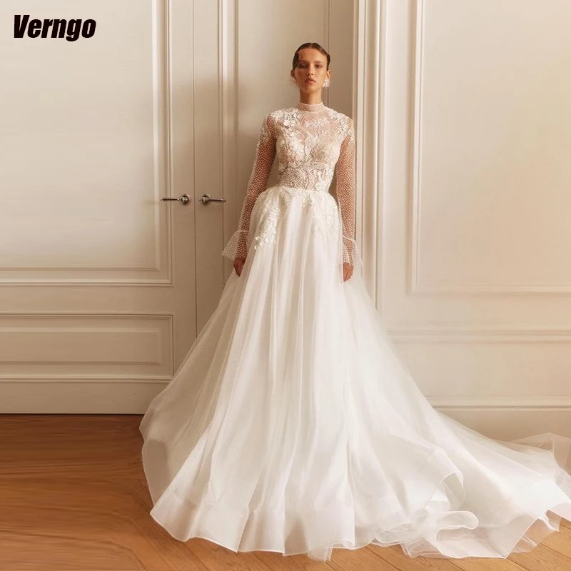 Свадебное платье из тюля в горошек Verngo, ТРАПЕЦИЕВИДНОЕ свадебное платье с высоким воротником и длинными рукавами, платье невесты с аппликацией, 2024
Свадебное платье из тюля в горошек Verngo, ТРАПЕЦИЕВИДНОЕ свадебное платье с высоким воротником и длинными рукавами, платье невесты с аппликацией, 2024