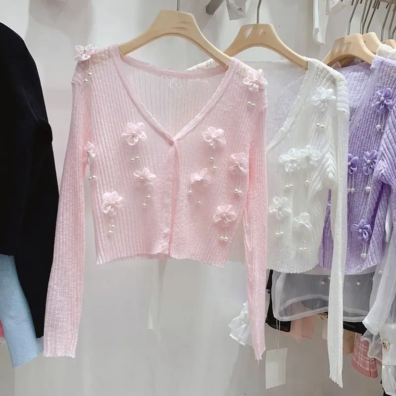 Small Flower Tassel Bead Cardigan Sunscreen Knitted Cardigan Three-dimensional Top
Small Flower Tassel Bead Cardigan Sunscreen Knitted Cardigan Three-dimensional Top