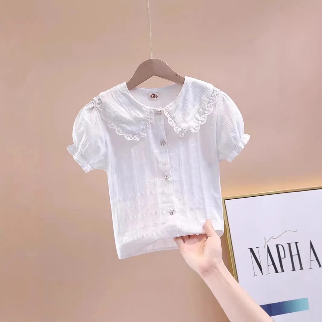 New Girls Shirt Short Sleeved 2026 Summer Korean Version Doll Collar Top with Bubble Sleeves Children's White Shirt
New Girls Shirt Short Sleeved 2026 Summer Korean Version Doll Collar Top with Bubble Sleeves Children's White Shirt