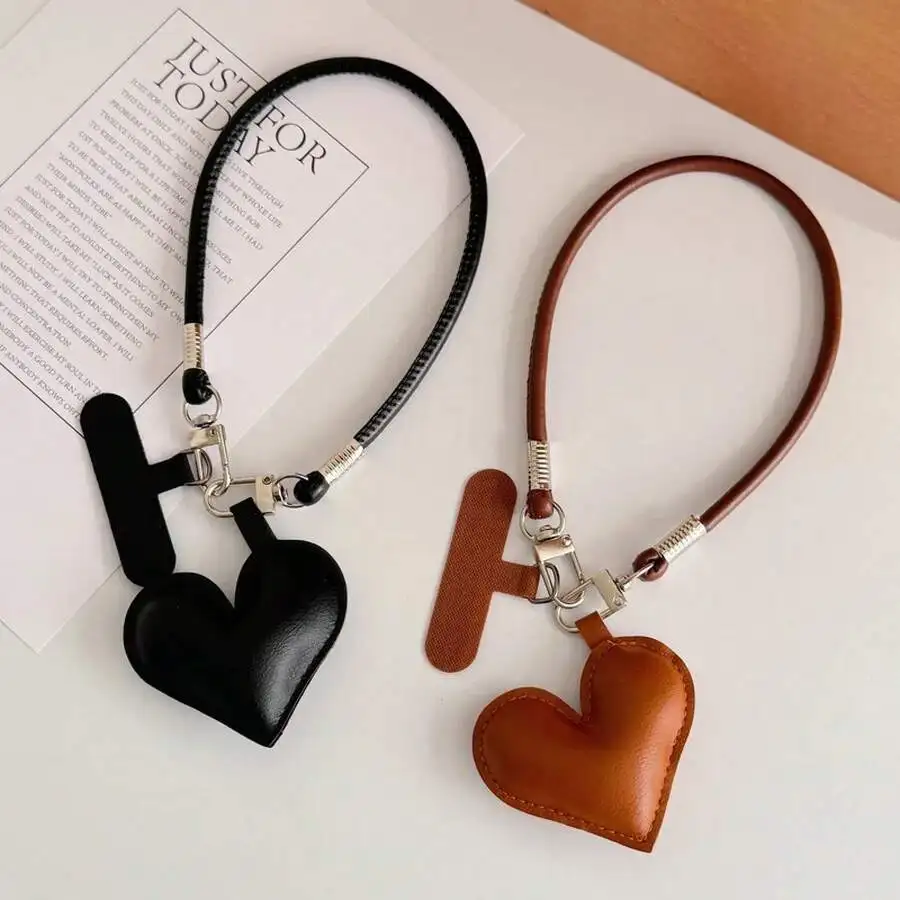 Leather Heart Phone Lanyard Short Wrist Strap Anti-Loss Charm Pendant
Leather Heart Phone Lanyard Short Wrist Strap Anti-Loss Charm Pendant