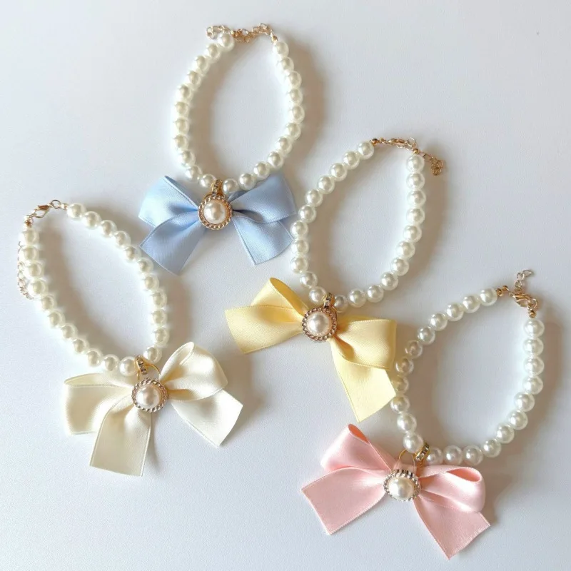 Pet Dog Collar Necklace Cute Pearl Necklace European Style Bow TieinsWind Bichon Teddy
Pet Dog Collar Necklace Cute Pearl Necklace European Style Bow TieinsWind Bichon Teddy