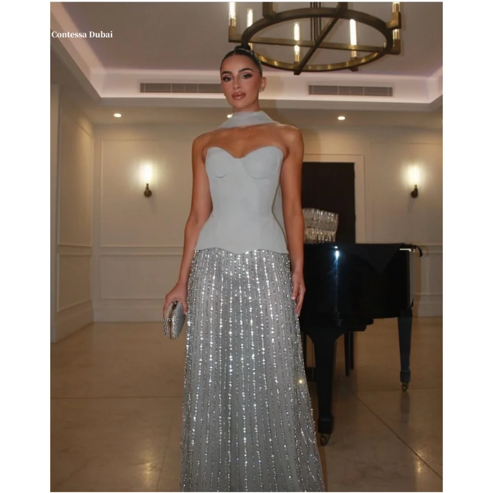 Contessa Dubai Синее блестящее шифоновое свадебное платье Длинные шелковые шарфы свадебные платья без бретелек فساتين سهرة Индивидуальные 2025
Contessa Dubai Синее блестящее шифоновое свадебное платье Длинные шелковые шарфы свадебные платья без бретелек فساتين سهرة Индивидуальные 2025