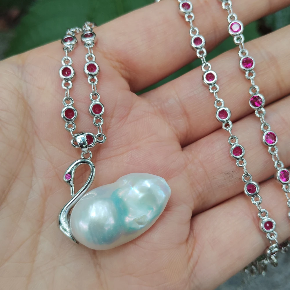 KKGEM 15x25mm Cultured White Reborn keshi Pearl Swan Pendant Chokers Rosary Chain Minimalist Necklaces 
KKGEM 15x25mm Cultured White Reborn keshi Pearl Swan Pendant Chokers Rosary Chain Minimalist Necklaces