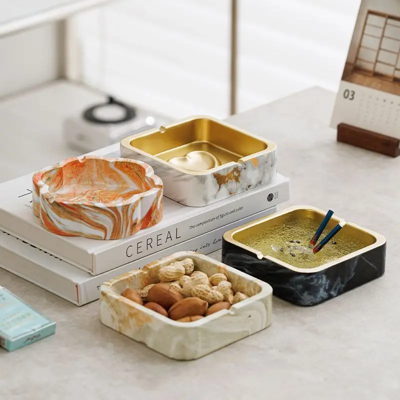 Креативная мраморная пепельница, цементная коробка для хранения, обеденный стол для гостиной, позолоченная пепельница в форме цветка, коробка для хранения конфет с фруктами, орехами, новинка
Креативная мраморная пепельница, цементная коробка для хранения, обеденный стол для гостиной, позолоченная пепельница в форме цветка, коробка для хранения конфет с фруктами, орехами, новинка