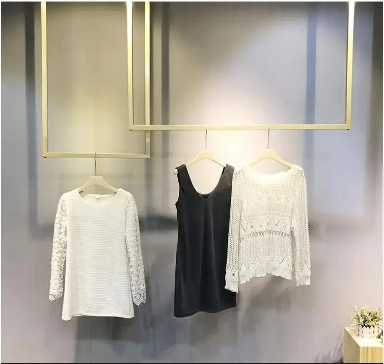 Clothing store display rack hanger gold ceiling hanging women's clothing store display rack wall clothing rack
Clothing store display rack hanger gold ceiling hanging women's clothing store display rack wall clothing rack
