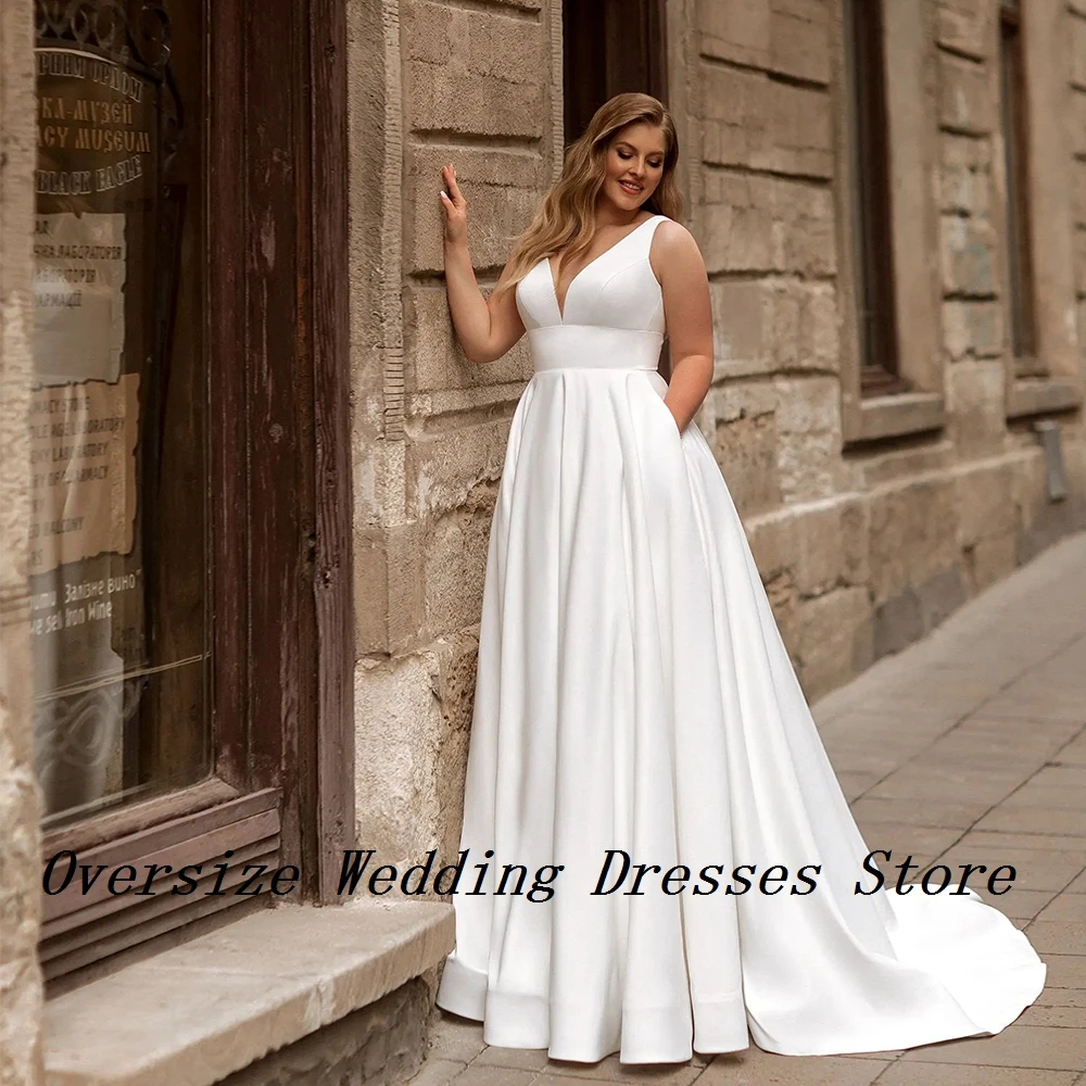 Plus Size A Line Wedding Dresses for Ladies Sleeveless V Neck Bridal Gowns with Jersey New Summer 2025 Robe De Mariée New
Plus Size A Line Wedding Dresses for Ladies Sleeveless V Neck Bridal Gowns with Jersey New Summer 2025 Robe De Mariée New