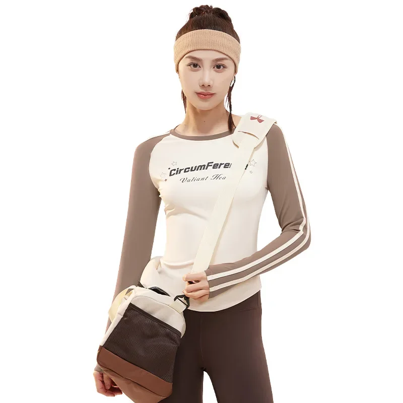 Round neck letter sports yoga printed long sleeved women's retro style color blocked woven belt high elasticity slimming T-shirt
Round neck letter sports yoga printed long sleeved women's retro style color blocked woven belt high elasticity slimming T-shirt