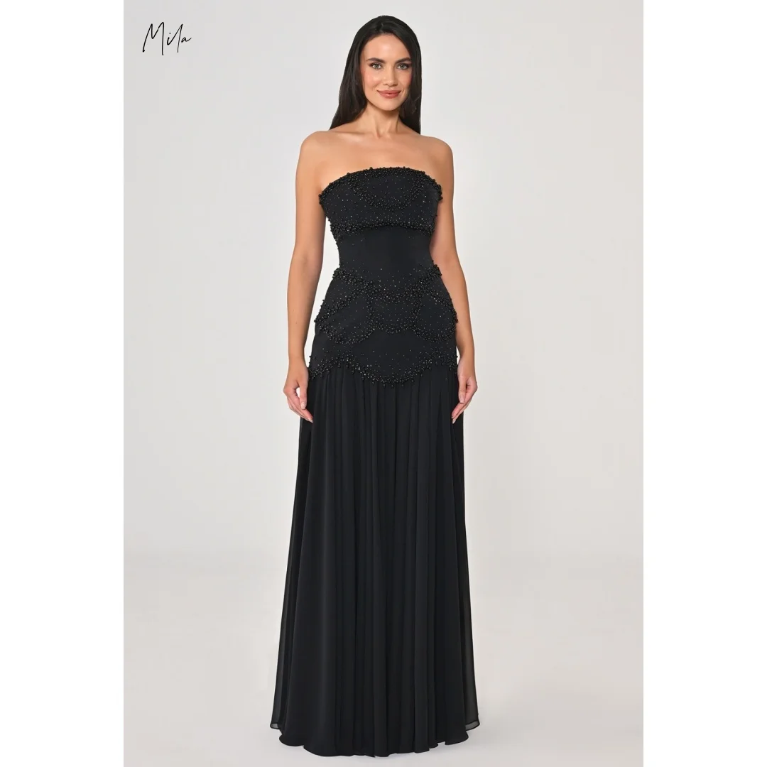 Bella Customized Black Strapless Prom Dress with Beaded Embellished Bodice and Flowing Pleated Chiffon Elegant Robes de soirée
Bella Customized Black Strapless Prom Dress with Beaded Embellished Bodice and Flowing Pleated Chiffon Elegant Robes de soirée