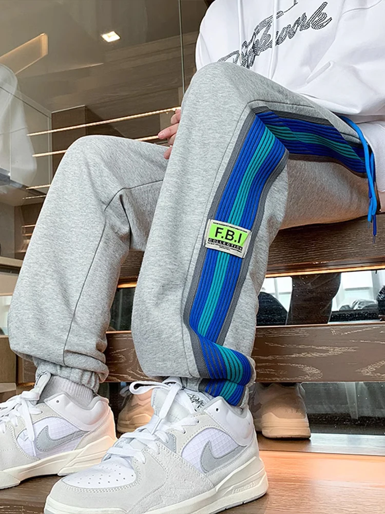 Подростковые полосатые спортивные брюки для мужчин, весенне-осенние, в американском стиле, с манжетами, модные, для старшеклассников, униформа...
Подростковые полосатые спортивные брюки для мужчин, весенне-осенние, в американском стиле, с манжетами, модные, для старшеклассников, униформа...