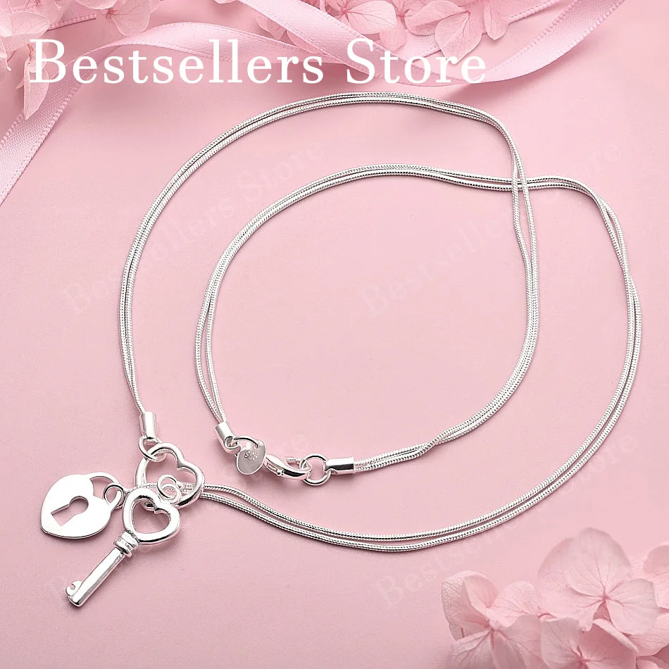 925 Sterling Silver Exquisite Heart-Shaped Lock Key Pendant Necklace for Women, Fashionable Party Wedding Gift Jewelry
925 Sterling Silver Exquisite Heart-Shaped Lock Key Pendant Necklace for Women, Fashionable Party Wedding Gift Jewelry
