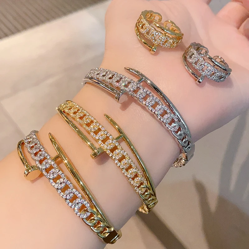 Gold Tone Cuban Link & Nail Design Cuff Bracelet with Micro Pave Zircon INS Style Statement jewelry
Gold Tone Cuban Link & Nail Design Cuff Bracelet with Micro Pave Zircon INS Style Statement jewelry