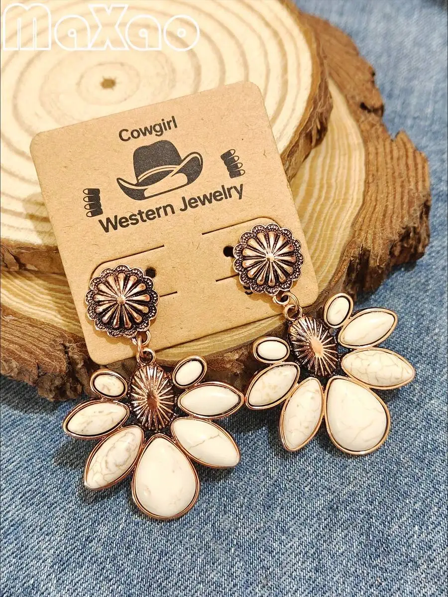 Vintage distressed copper dangle earrings with faux turquoise petals and embossed western flower detail at ear post
Vintage distressed copper dangle earrings with faux turquoise petals and embossed western flower detail at ear post