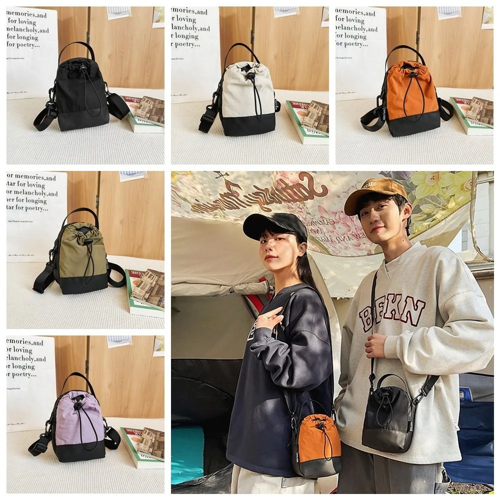 Lightweight Nylon Phone Bag Zipper Splicing Color Mini Casual Crossbody Bag Adjustable Strap Coin Purse Canvas Shoulder Bag
Lightweight Nylon Phone Bag Zipper Splicing Color Mini Casual Crossbody Bag Adjustable Strap Coin Purse Canvas Shoulder Bag