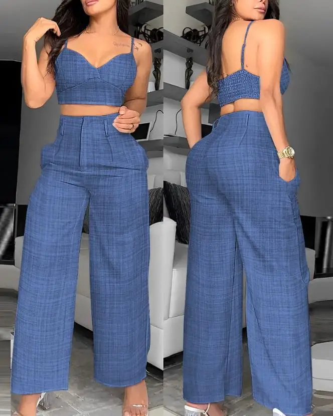 Женский комплект из укороченного топа на бретельках под джинсовую ткань и брюк с высокой талией и широкими штанинами, идеально подходящий для летнего отдыха
Женский комплект из укороченного топа на бретельках под джинсовую ткань и брюк с высокой талией и широкими штанинами, идеально подходящий для летнего отдыха