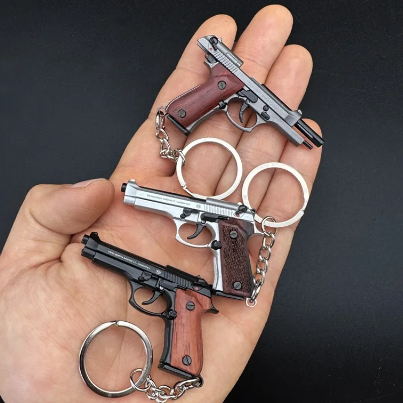 Metal Keychain Hanging Ornament Solid Wood Handle 1:4 Creative 92F Small Gun Key Chain Ring Accessories Pendant Gift
Metal Keychain Hanging Ornament Solid Wood Handle 1:4 Creative 92F Small Gun Key Chain Ring Accessories Pendant Gift