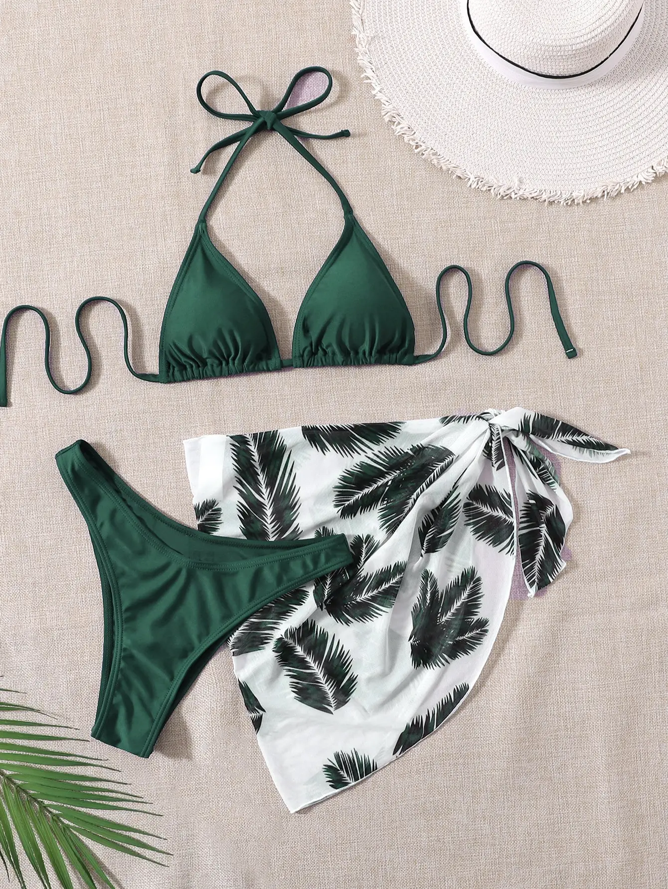 Green Triangle Halter Bikini Set With Leaf Print Cover Up Skirt 3 Piece
Green Triangle Halter Bikini Set With Leaf Print Cover Up Skirt 3 Piece