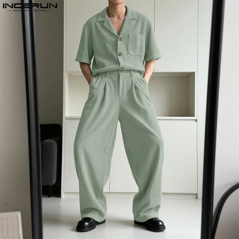 INCERUN Мужские вельветовые комплекты, однотонная рубашка с короткими рукавами и брюки с лацканами, комплекты из двух предметов, уличная одежда, свободные модные мужские костюмы 2025 года
INCERUN Мужские вельветовые комплекты, однотонная рубашка с короткими рукавами и брюки с лацканами, комплекты из двух предметов, уличная одежда, свободные модные мужские костюмы 2025 года
