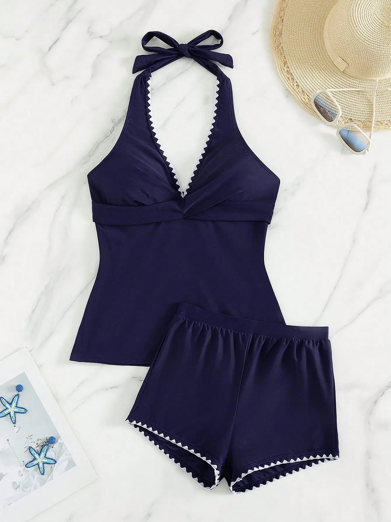 Navy Blue 2 Piece Halter Neck Swimsuit Set With Criss-Cross Front And Scallop Trim
Navy Blue 2 Piece Halter Neck Swimsuit Set With Criss-Cross Front And Scallop Trim