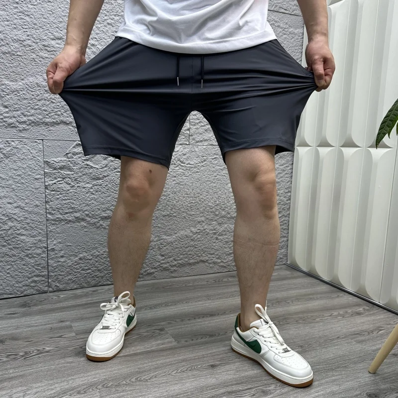 Легкие дышащие спортивные брюки из ледяного шелка с гладким драпированием, летние мужские брюки-капри, комфортные
Легкие дышащие спортивные брюки из ледяного шелка с гладким драпированием, летние мужские брюки-капри, комфортные