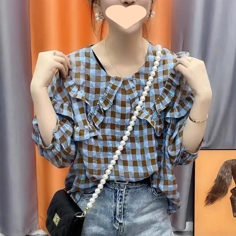 Doll Collar Plaid Shirt for Women 2025 Summer Lotus Edge Bubble Sleeve Shirt Designed Sense Top
Doll Collar Plaid Shirt for Women 2025 Summer Lotus Edge Bubble Sleeve Shirt Designed Sense Top