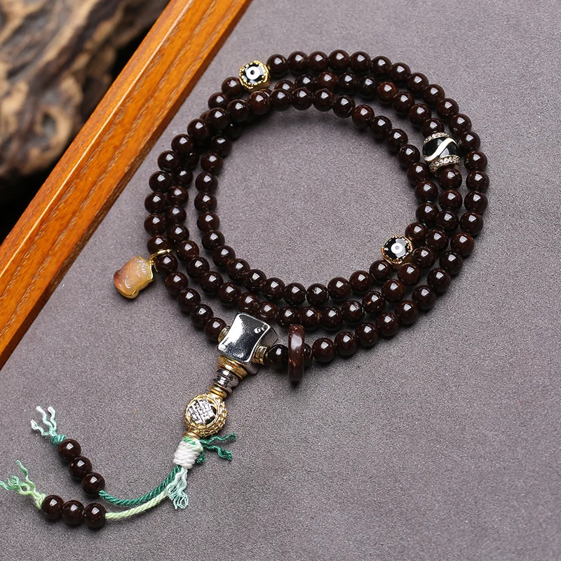 Natural, unbleached coconut-core Buddhist prayer beads with round agate beads, copper clasp and three-way connector
Natural, unbleached coconut-core Buddhist prayer beads with round agate beads, copper clasp and three-way connector