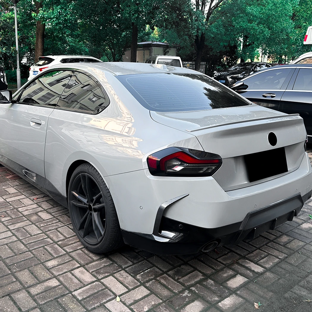 2PCS Car Diffuser Rear Wind Knife Rear Bumper for BMW 2 Series G42 M Sport 2022+ Spoiler Lip Splitter Air Vent Trim Body Kits 
2PCS Car Diffuser Rear Wind Knife Rear Bumper for BMW 2 Series G42 M Sport 2022+ Spoiler Lip Splitter Air Vent Trim Body Kits