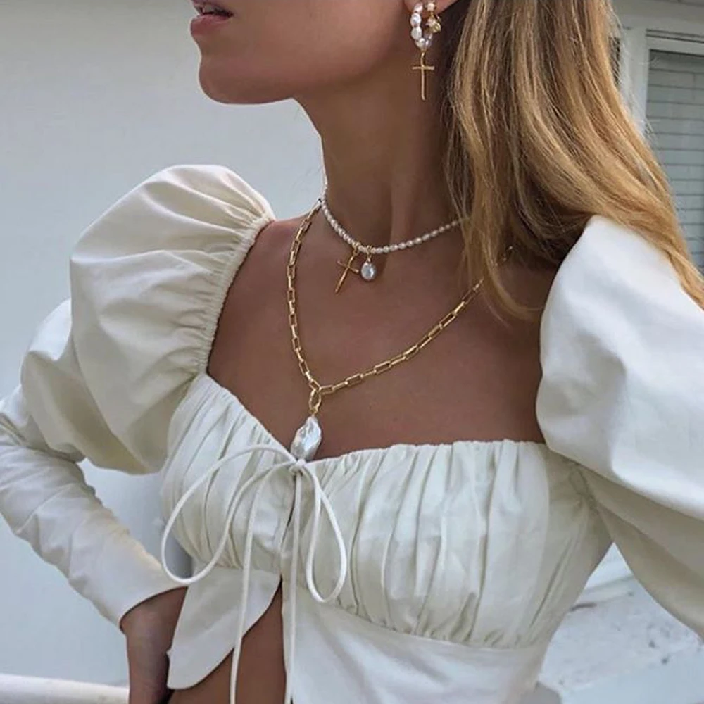 European and American Ins Retro Simple Cross Pendant Hand-Beaded Pearl Sweater Chain Jewelry Women's Wholesale
European and American Ins Retro Simple Cross Pendant Hand-Beaded Pearl Sweater Chain Jewelry Women's Wholesale