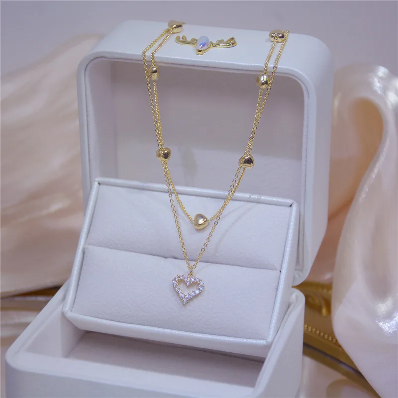 2022 Fashion New Gold Color Double Layer Heart Necklace For Women Clavicle Chain Elegant Charm Wedding Pendant Jewelry
2022 Fashion New Gold Color Double Layer Heart Necklace For Women Clavicle Chain Elegant Charm Wedding Pendant Jewelry