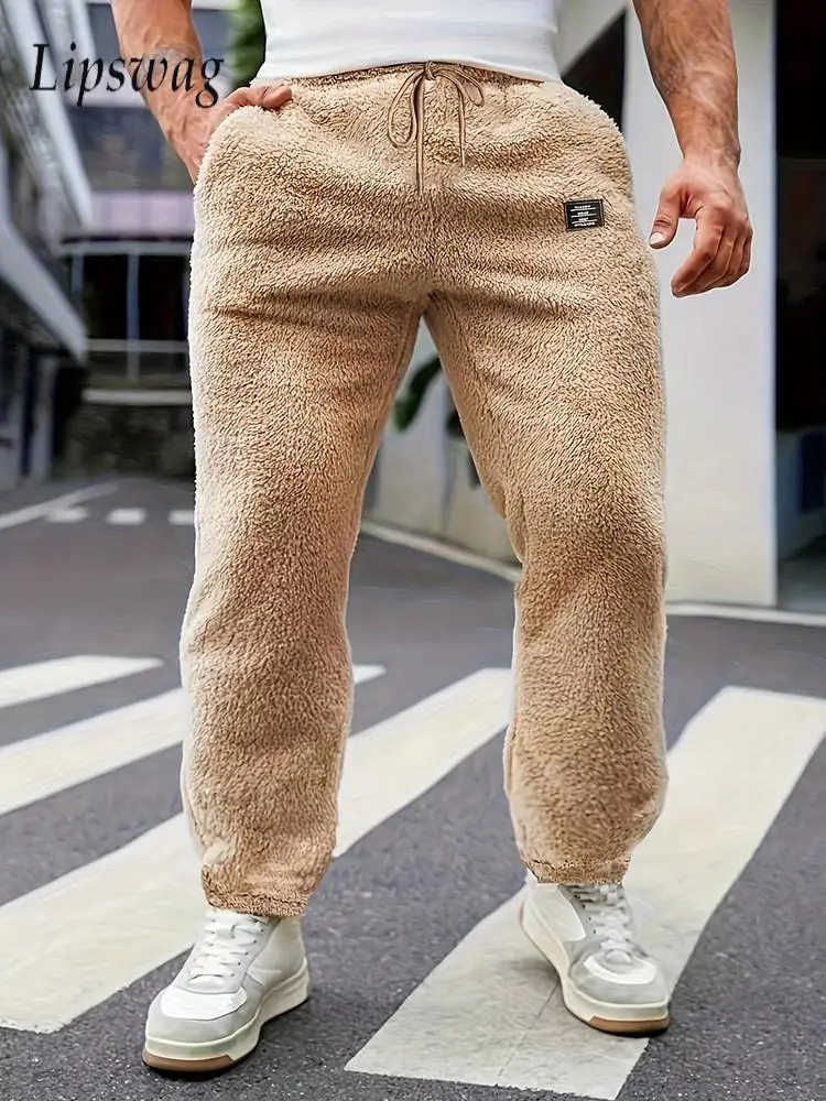 Уличная одежда, винтажные мужские флисовые брюки, повседневные свободные прямые брюки на шнурке, мужские осенние стильные уютные меховые флисовые спортивные штаны
Уличная одежда, винтажные мужские флисовые брюки, повседневные свободные прямые брюки на шнурке, мужские осенние стильные уютные меховые флисовые спортивные штаны
