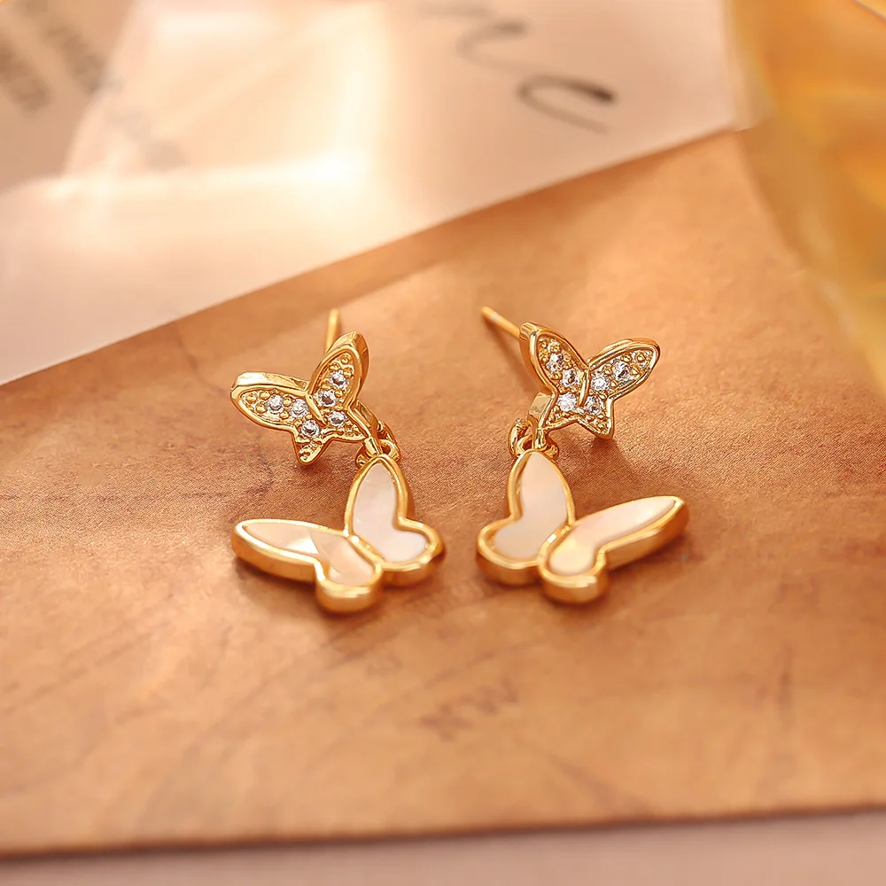 Fashionable and exquisite micropaved zircon butterfly shell earrings, long temperament earrings, high-end commuter earrings
Fashionable and exquisite micropaved zircon butterfly shell earrings, long temperament earrings, high-end commuter earrings