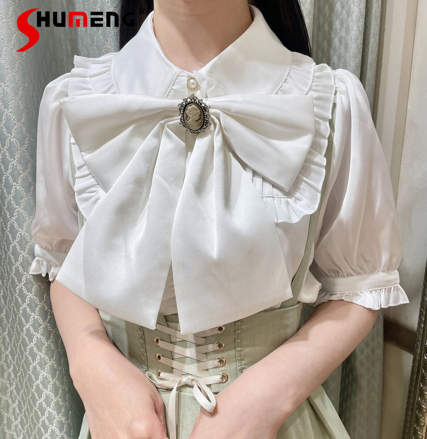 Japanese Style Sweet Cute Retro Blouse Doll Collar Lace-up Bow Bubble Sleeve Single-breasted Versatile Lolita Shirts Tops Women
Japanese Style Sweet Cute Retro Blouse Doll Collar Lace-up Bow Bubble Sleeve Single-breasted Versatile Lolita Shirts Tops Women