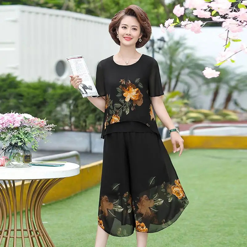 Women Middle Aged Summer Floral Chiffon Top Wide Leg Culottes Two Piece Set Plus Size Daily Outfit
Women Middle Aged Summer Floral Chiffon Top Wide Leg Culottes Two Piece Set Plus Size Daily Outfit