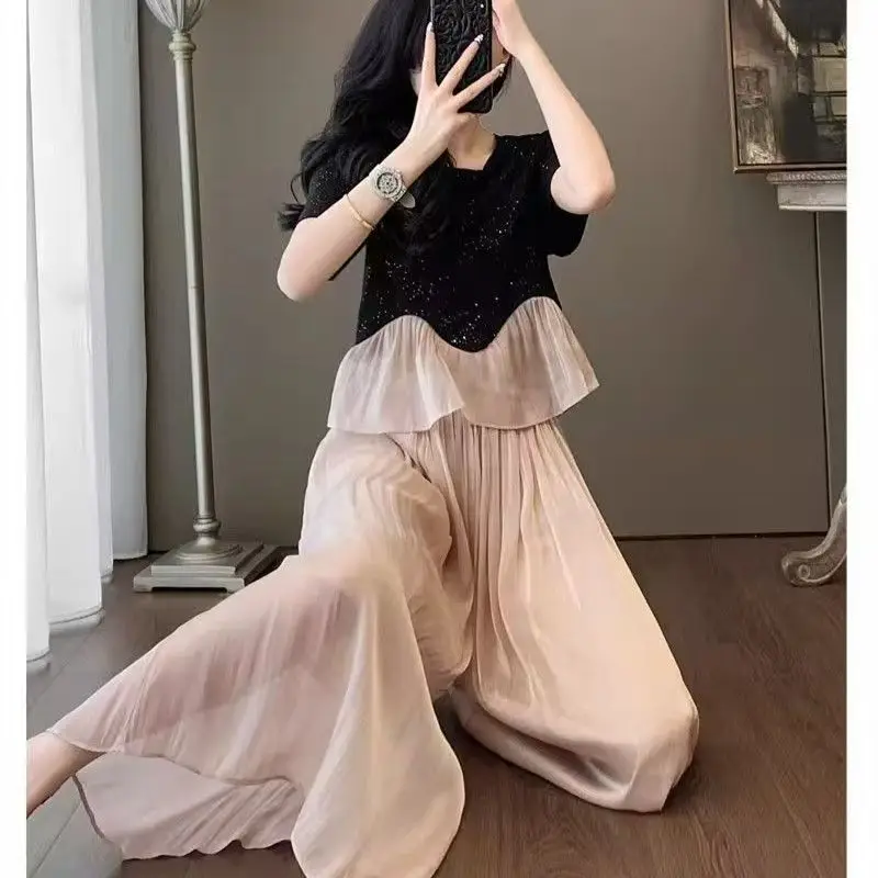 Women French Elegant Glitter Spliced Short Sleeve Top High Waist Pleated Wide Leg Culottes Summer Two Piece Set
Women French Elegant Glitter Spliced Short Sleeve Top High Waist Pleated Wide Leg Culottes Summer Two Piece Set