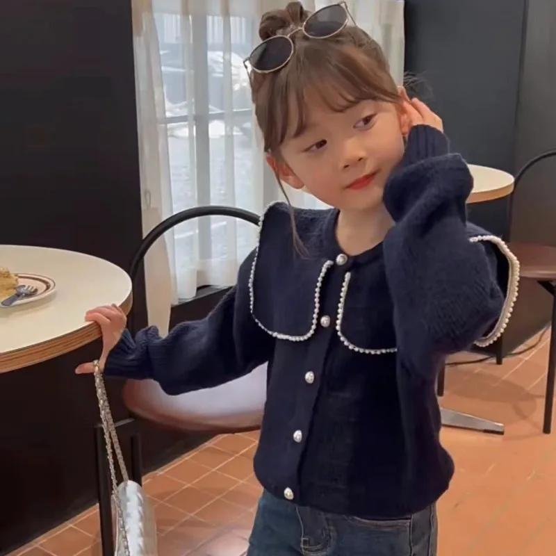 Girls' 2025 Spring New Korean Style Stylish Cardigan Knitwear with Ruffled Neckline, Fashion Sweater for Children
Girls' 2025 Spring New Korean Style Stylish Cardigan Knitwear with Ruffled Neckline, Fashion Sweater for Children