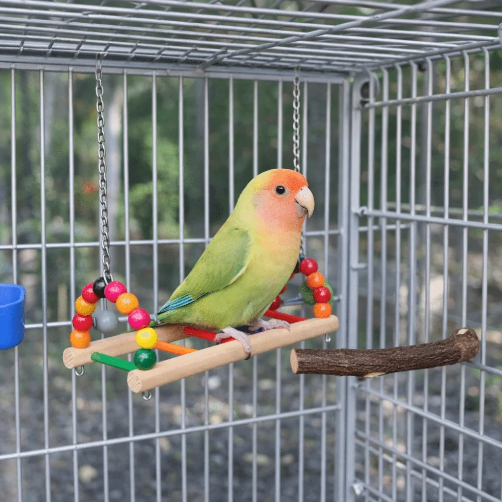 Multi Functional Bite Resistant Parrot Swing Colorful Hanging Bird Cage Standing Wooden Pet Suspension Bridge Interaction
Multi Functional Bite Resistant Parrot Swing Colorful Hanging Bird Cage Standing Wooden Pet Suspension Bridge Interaction
