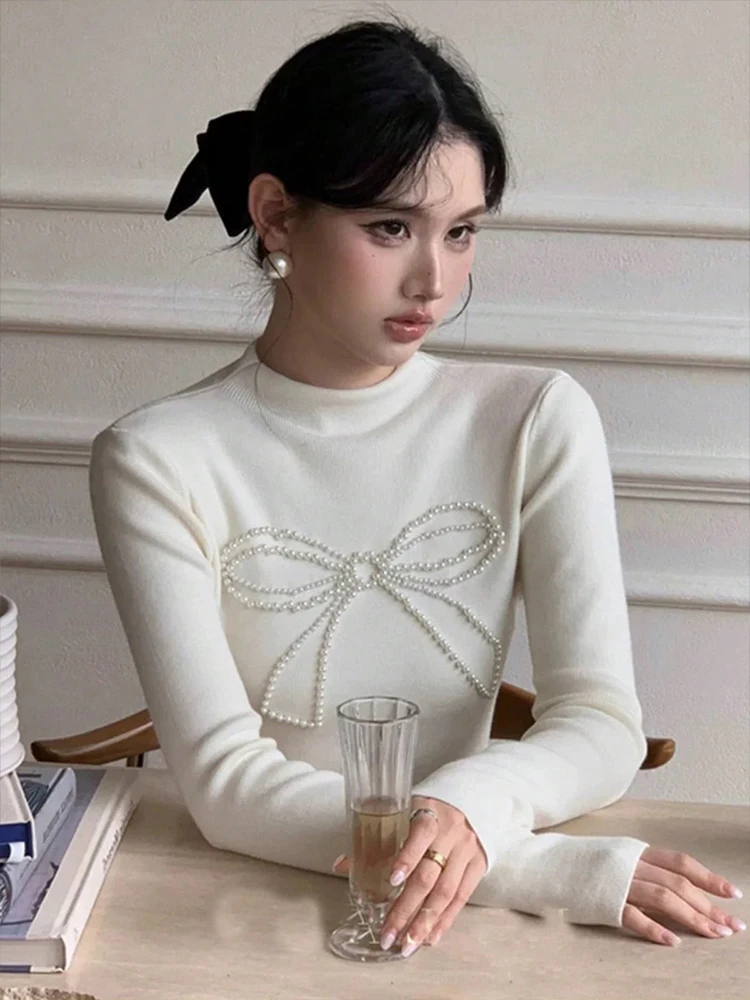 New Elegant Pearl Bow Half-High Round Neck Knitted Long Sleeve Pullover Korean Slim Tops Liner Women's Sweater Fall Winter Warm
New Elegant Pearl Bow Half-High Round Neck Knitted Long Sleeve Pullover Korean Slim Tops Liner Women's Sweater Fall Winter Warm