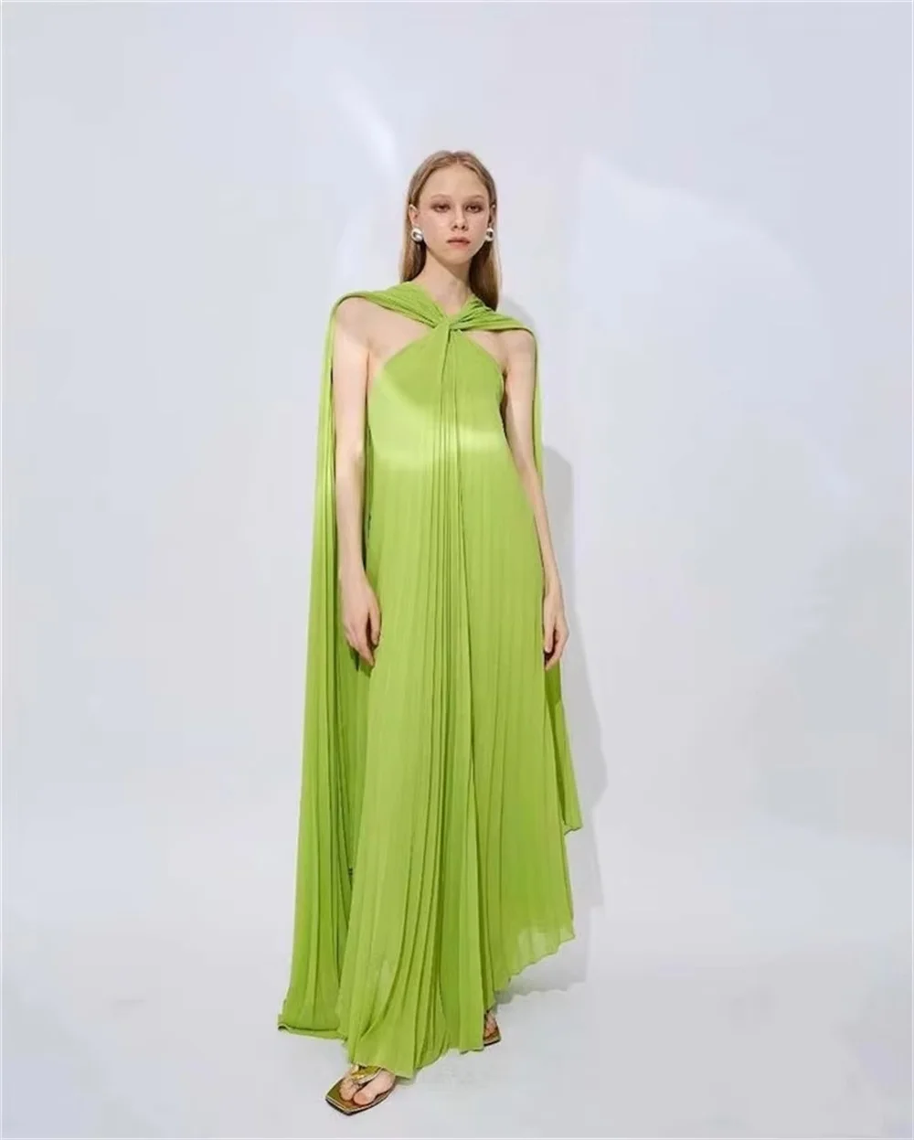 Custom bright sleeveless shawl floor-length dress with loose draping fit to flatter all figures. Simple tailored design brings c
Custom bright sleeveless shawl floor-length dress with loose draping fit to flatter all figures. Simple tailored design brings c