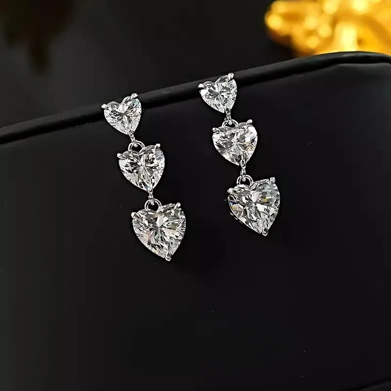 Новые динамические серьги из серебра 925 пробы, легкие, роскошные, с кисточками в форме сердца, инкрустированные, выращивающие, изысканный нишевый дизайн, простой дизайн
Новые динамические серьги из серебра 925 пробы, легкие, роскошные, с кисточками в форме сердца, инкрустированные, выращивающие, изысканный нишевый дизайн, простой дизайн
