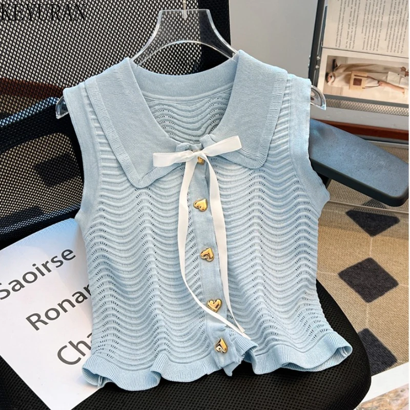2025 Summer New Lapel Sleeveless Sweater Knitted Vest Women Korean Sweet Bow Temperament Heart Single Breasted Slim Fit Crop Top
2025 Summer New Lapel Sleeveless Sweater Knitted Vest Women Korean Sweet Bow Temperament Heart Single Breasted Slim Fit Crop Top