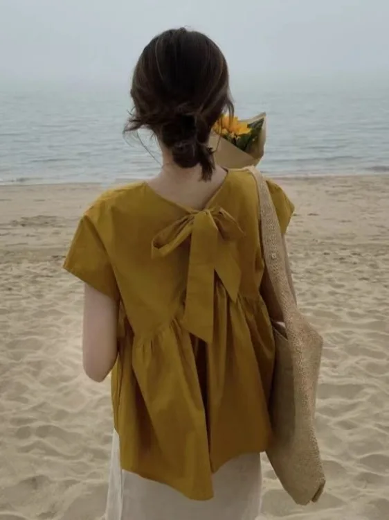 Желтый летний топ для женщин: свободный крой, короткий рукав, круглый вырез, с узлом, модный летний комбинезон, повседневная одежда в стиле кэжуал
Желтый летний топ для женщин: свободный крой, короткий рукав, круглый вырез, с узлом, модный летний комбинезон, повседневная одежда в стиле кэжуал