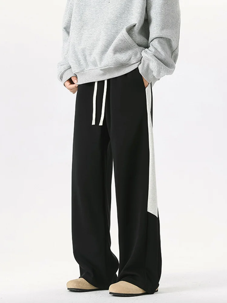 Мужские повседневные брюки в американском стиле с пэчворком и полосками, новые весенние, прямые, свободные, длинные, модные, широкие, спортивные, из тонкой ткани.
Мужские повседневные брюки в американском стиле с пэчворком и полосками, новые весенние, прямые, свободные, длинные, модные, широкие, спортивные, из тонкой ткани.