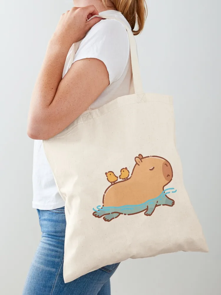 Capybara swimming with two birds on his back Tote Bag tote bag screen reusable shopping bag free delivery bags
Capybara swimming with two birds on his back Tote Bag tote bag screen reusable shopping bag free delivery bags
