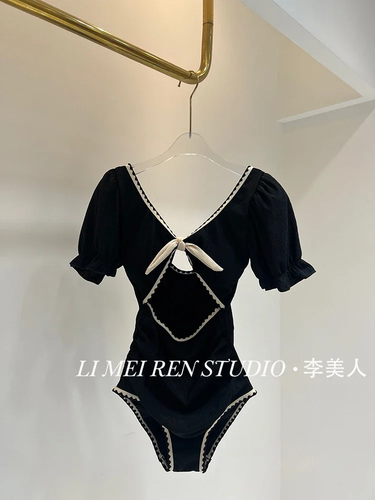 New black one-piece swimsuit for women's vacation
New black one-piece swimsuit for women's vacation