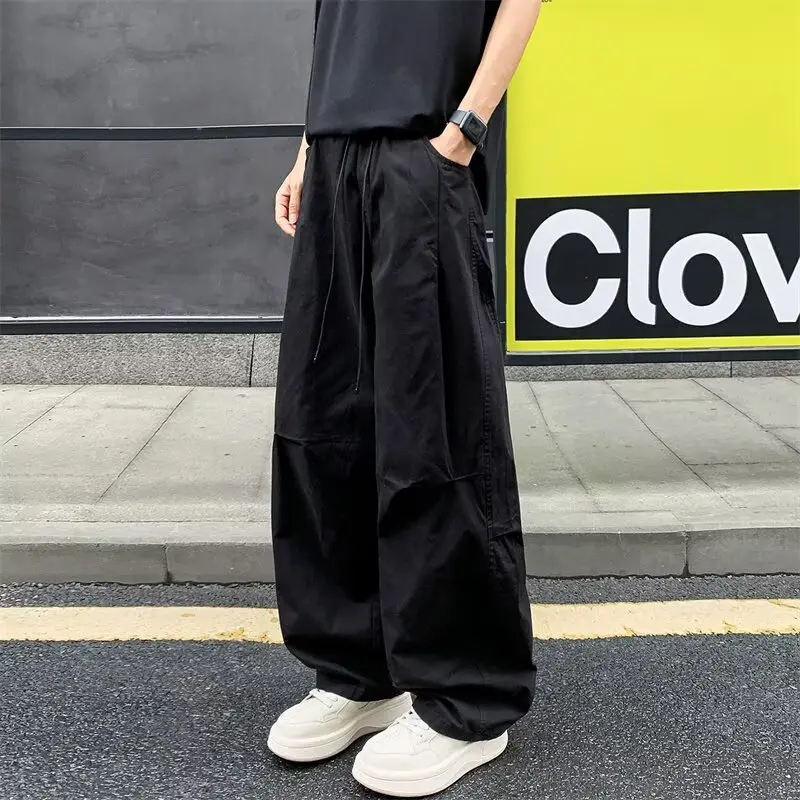 Retro new men's autumn quick drying wide leg pants military green work pants street loose straight drawstring casual long pants
Retro new men's autumn quick drying wide leg pants military green work pants street loose straight drawstring casual long pants