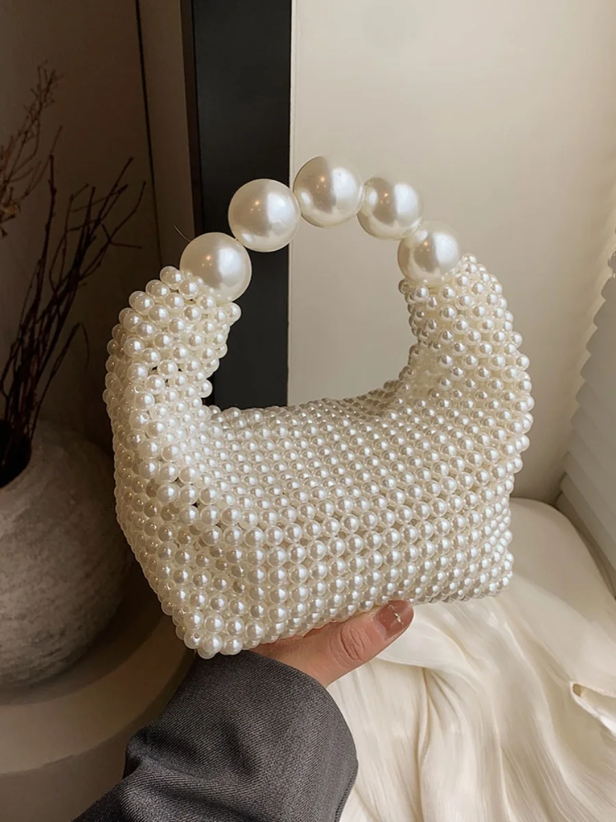 Original Design of The New Hand Carry Dinner Bag Women Fashion Pearl Woven Handbag Crossbody Сумка Женская Free Shipping
Original Design of The New Hand Carry Dinner Bag Women Fashion Pearl Woven Handbag Crossbody Сумка Женская Free Shipping