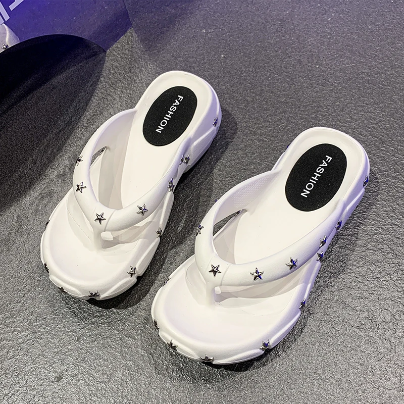 A pair of children's and teens' star-decorated platform flip-flops non-slip thick sole for summer beach daily use MM-1915-000
A pair of children's and teens' star-decorated platform flip-flops non-slip thick sole for summer beach daily use MM-1915-000